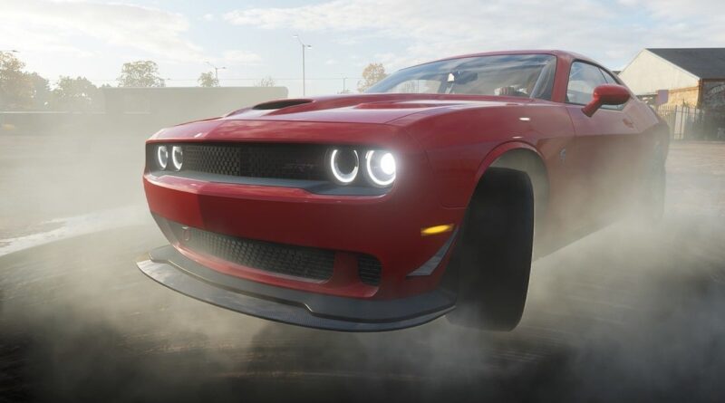 автомобиль dodge challenger в дыму